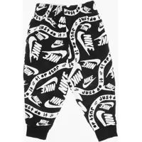 Pantaloni de trening pentru Baieti - Pantaloni de trening Nike All-Over Logo Printed Two-Tone Club Joggers White Baieti (BM 12382899) - B-mall.ro