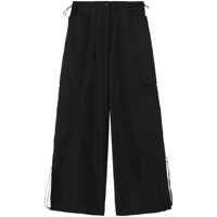 Pantaloni casual Palm Angels High-Rise Parachute Trousers Femei